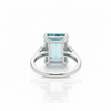 Three-Stone Emerald-Cut Blue Topaz Ring with Brilliant Diamond Side Clusters