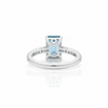 Emerald-Cut Blue Topaz Solitaire Ring in 14K White Gold with Pavé Diamond Band