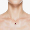Heart-Cut Ruby Pendant in an Open 14K Yellow Gold Heart with Diamond Accents