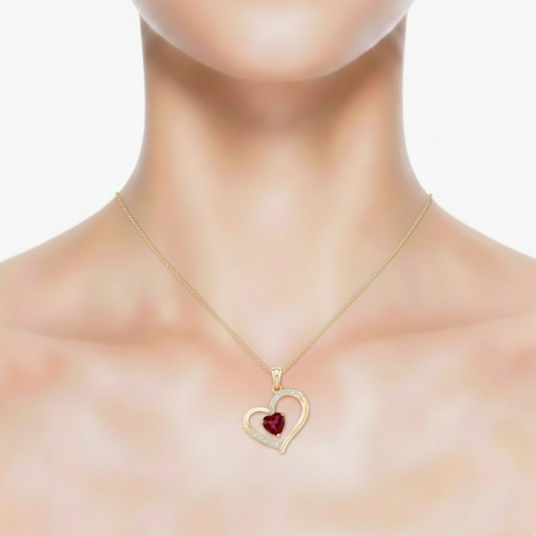Heart-Cut Ruby Pendant in an Open 14K Yellow Gold Heart with Diamond Accents