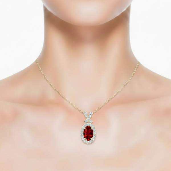 Oval-Cut Ruby Halo Pendant in 14K Yellow Gold with Diamond-Set "X" Bale