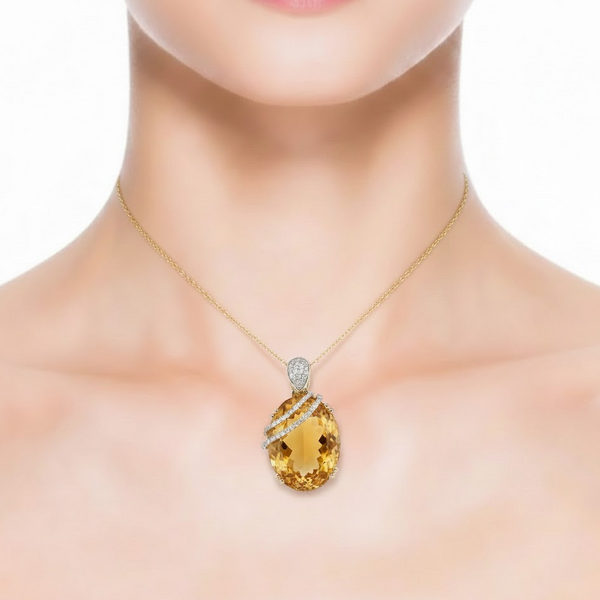 Large Oval-Cut Citrine Pendant in 14K Yellow Gold with Diamond Bypass Detail