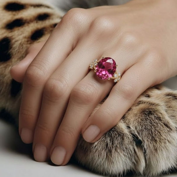 Oval shape-Stone Ruby in Diamond Ring.