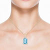 Emerald-Cut Blue Topaz Pendant in 14K Yellow Gold with Diamond V-Bale