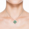 Intricate White Gold Emerald Pendant featuring a Radiant Pave Diamond Flower Motif