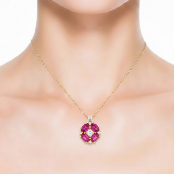 Oval-Cut Ruby Solitaire Pendant in 14K yellow Gold with Diamond Accent