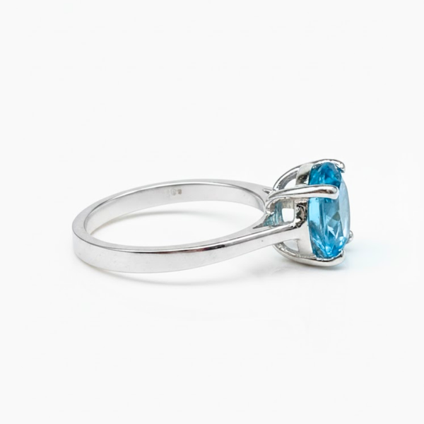 Oval Blue Topaz Sterling Silver Ring