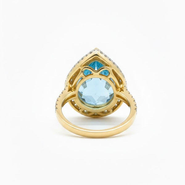 Prism of Light Opal Cabochon with Oval Ruby Surround In Diamond