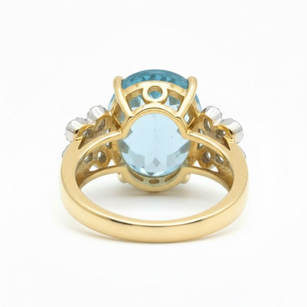 Prism of Light Opal Cabochon with Oval Ruby Surround In Diamond