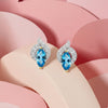 Blue Topaz Solitaires with Diamond Pavé Accents