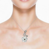 Hand-Carved White Shell Floral Vine Pendant with Pearl Accent