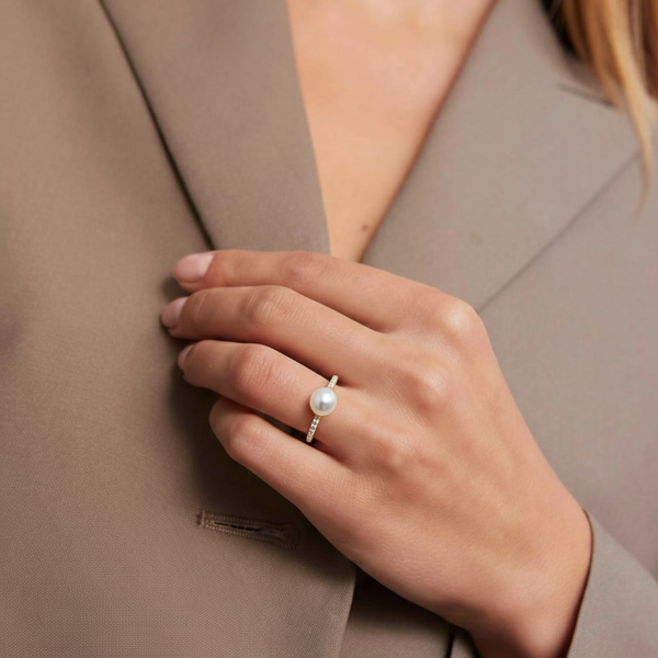 Classic Pearl Engagement Ring with a Shimmering Micro-Pavé Diamond Setting