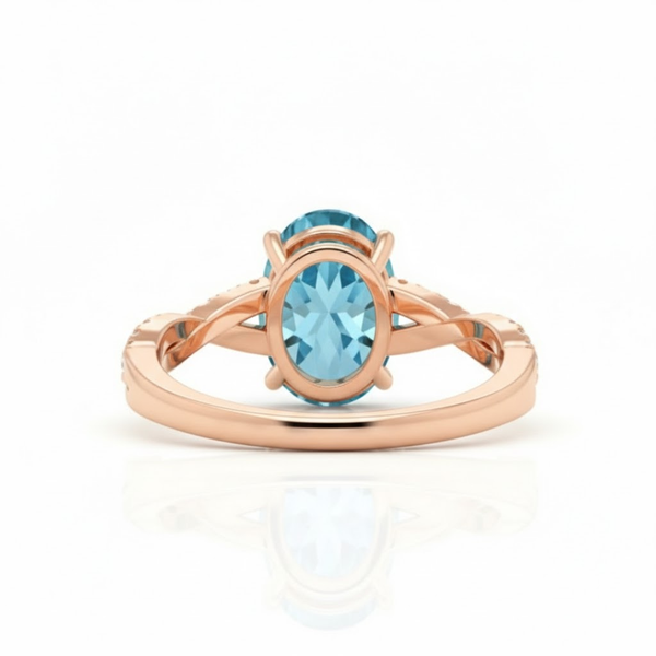 Oval-Cut Blue Topaz Ring in 14K Rose Gold with Pavé Diamond Twisted Shank