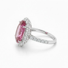 Oval Cut Ruby Solitaire with Tapered Diamond Halo