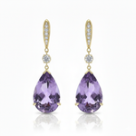 Royal Blue Sapphire Center with Oval Emerald Shoulders in White Gold