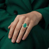 Classic Oval Emerald Halo Ring with Diamond