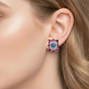 Cushion-Cut Blue Topaz Stud Earrings with Pear-Cut Ruby Sunburst Halo