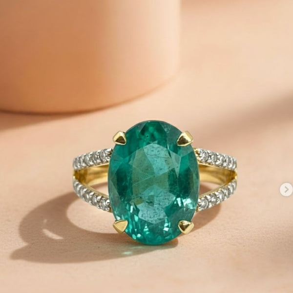 Classic Oval Emerald Halo Ring with Diamond