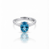 Oval Blue Topaz Solitaire Ring