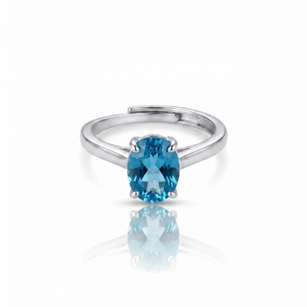 Oval Blue Topaz Solitaire Ring