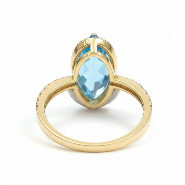 Prism of Light Opal Cabochon with Oval Ruby Surround In Diamond