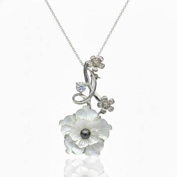 Hand-Carved White Shell Floral Vine Pendant with Pearl Accent
