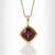 Bazel Cut Garnet In Gold Pendent