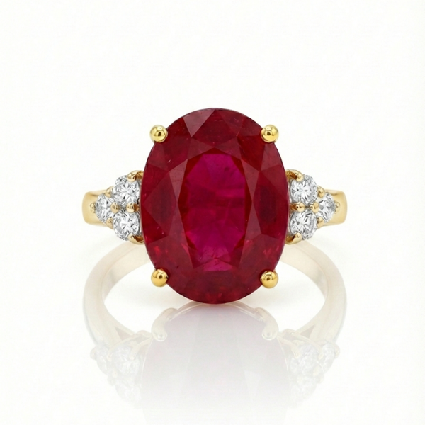 Majestic Oval Ruby Gold Ring with Brilliant Round Diamond Side Stones