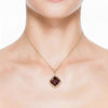Bazel Cut Garnet In Gold Pendent