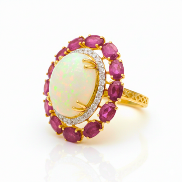 Prism of Light Opal Cabochon with Oval Ruby Surround In Diamond