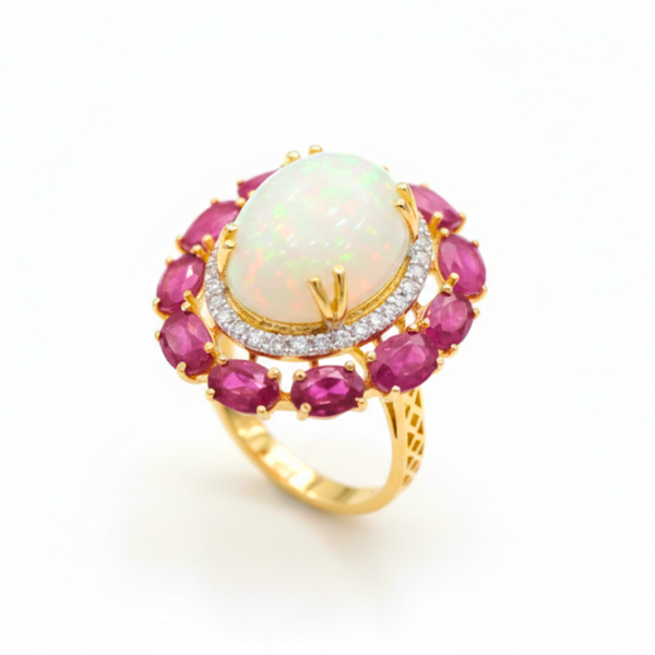 Prism of Light Opal Cabochon with Oval Ruby Surround In Diamond