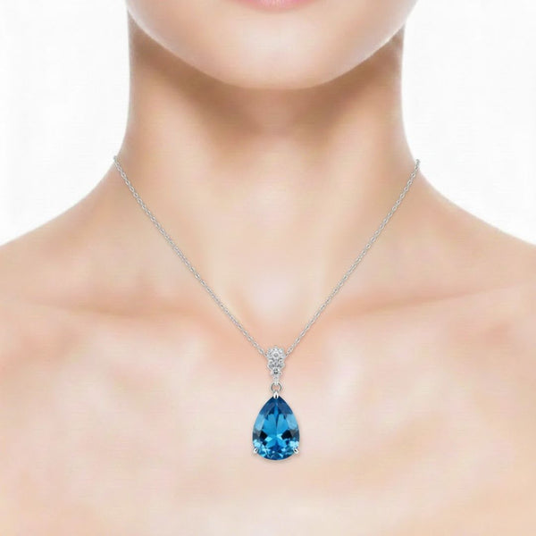 Carved Blue sapphire Halo Pendant