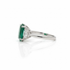 Oval Cut Emerald and Lab Grown Diamond Three-Stone Ring