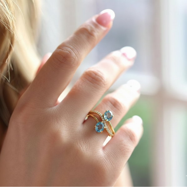 Two-Stone Oval Blue Topaz Bypass Ring in 14K Yellow Gold with Pavé Diamonds