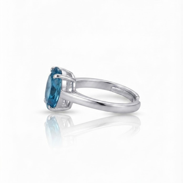 Oval Blue Topaz Solitaire Ring