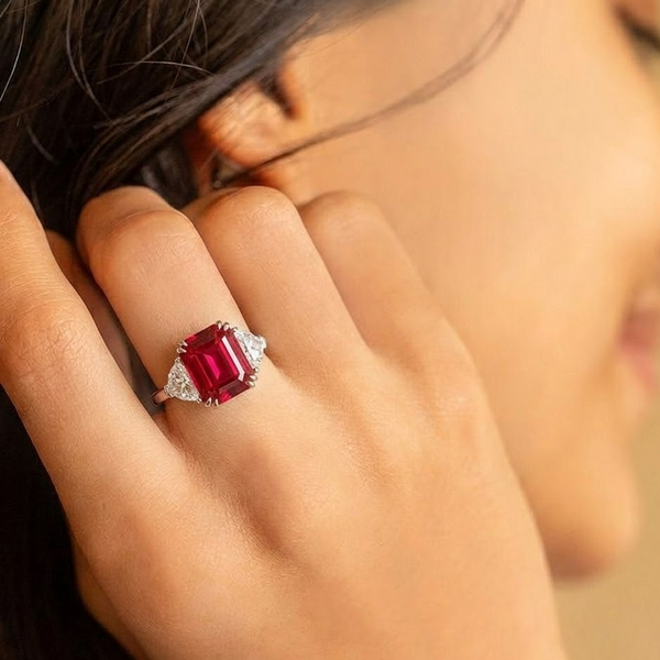 Emerald-Cut Ruby Three-Stone Ring with Diamond Accents