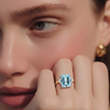 Three-Stone Emerald-Cut Blue Topaz Ring with Brilliant Diamond Side Clusters